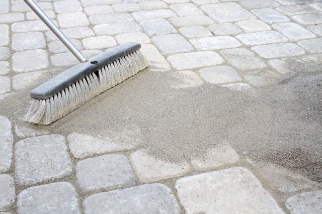 Applying polymeric sand