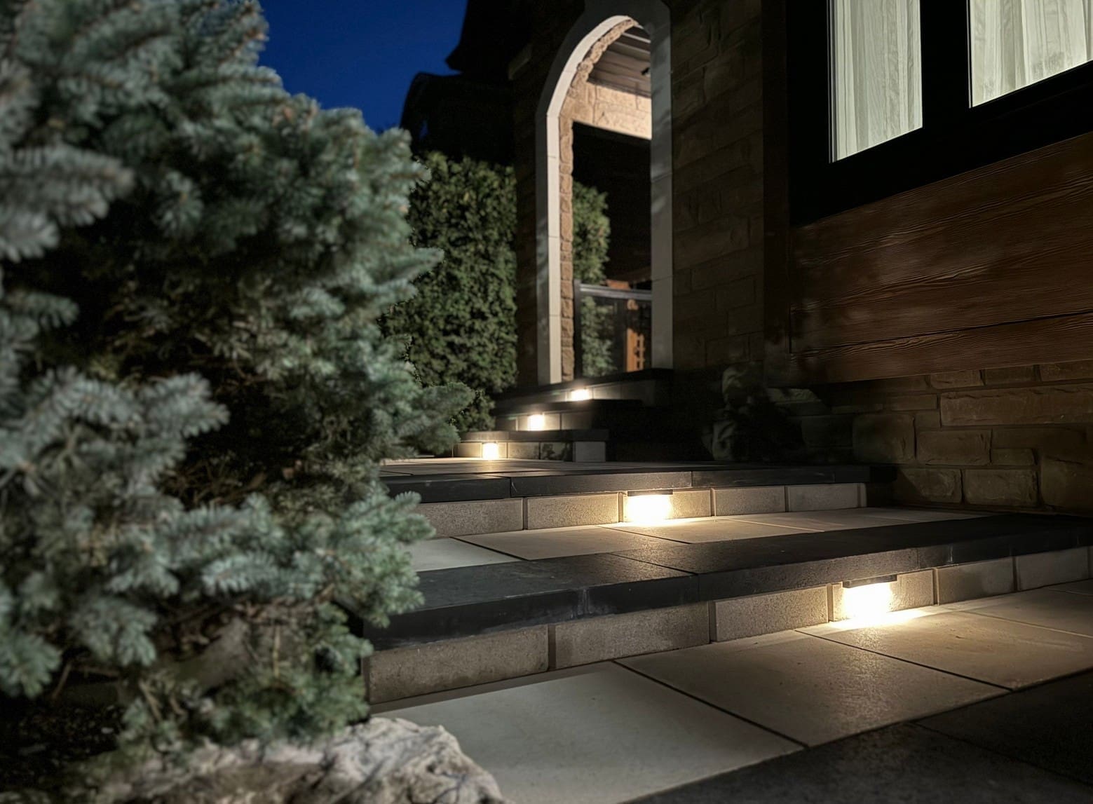  Oakville interlocking steps with built-in landscape lighting for safer nighttime use.