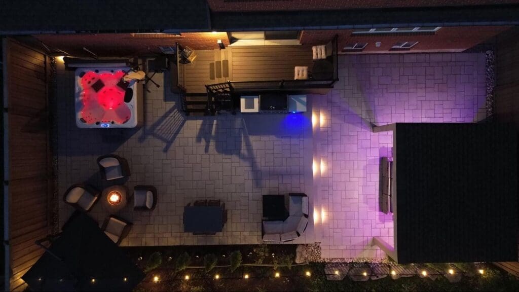 Oakville interlocking and modern landscaping with outdoor lighting around the patio.