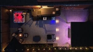 Oakville interlocking and modern landscaping with outdoor lighting around the patio.