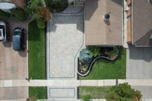 Full interlocking driveway in Mississauga with decorative border and paver patterns.